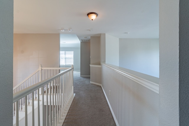 hallway featuring carpet