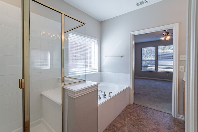 bathroom with separate shower and tub and ceiling fan