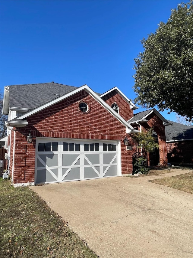 view of property exterior featuring a garage