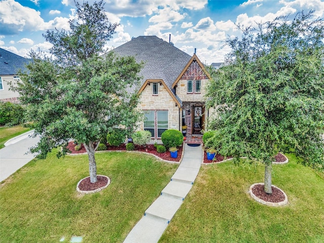 view of front of house with a front lawn