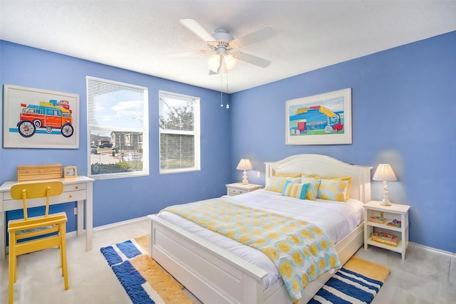 bedroom featuring a textured ceiling and ceiling fan