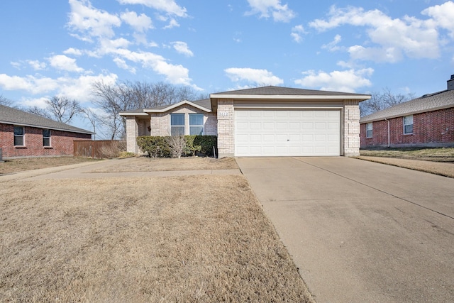 ranch-style house featuring a garage