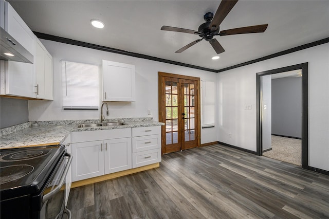 kitchen with white cabinetry, sink, crown molding, and french doors