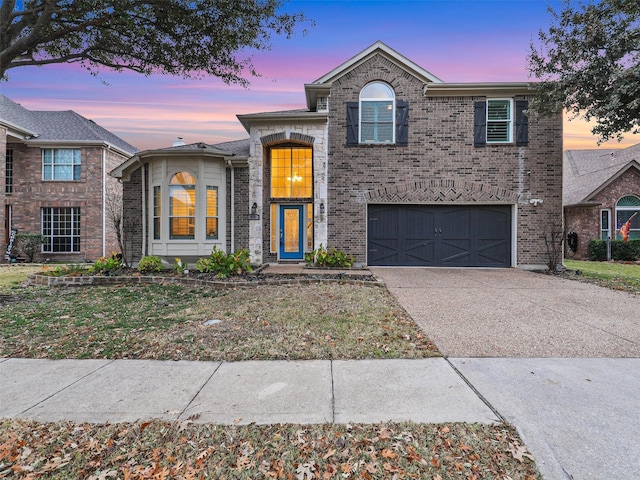 view of front of property featuring a garage