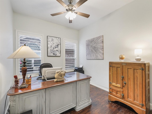 office space with ceiling fan and dark wood-type flooring