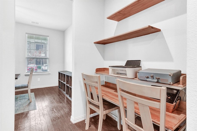 home office with wood-type flooring