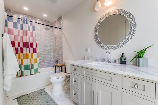 full bathroom featuring tile patterned floors, vanity, shower / tub combo, and toilet