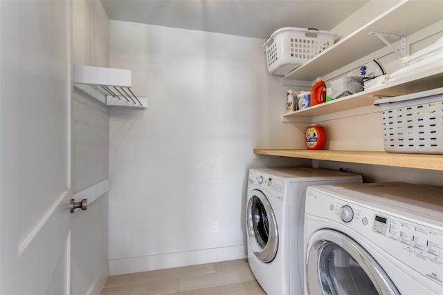 laundry area featuring washer and clothes dryer