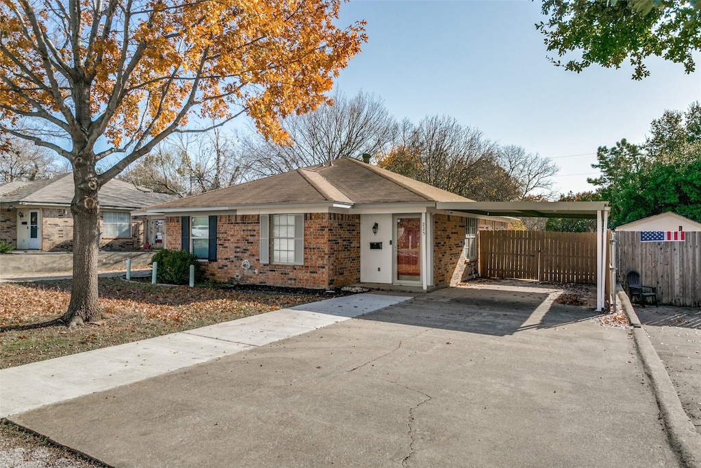 view of front of house featuring a carport