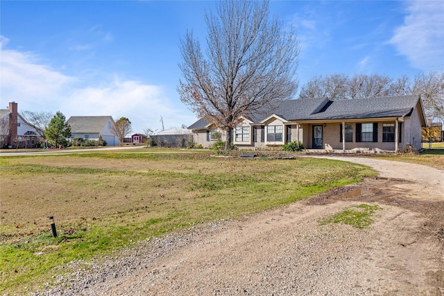 view of front of home with a front lawn