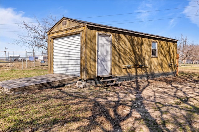 view of outbuilding with a garage