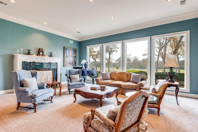 living room featuring a high end fireplace, crown molding, light colored carpet, and a healthy amount of sunlight