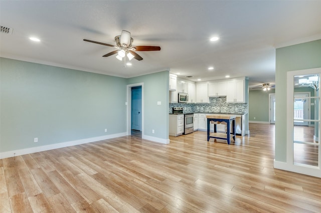 unfurnished living room featuring ceiling fan, ornamental molding, and light hardwood / wood-style flooring