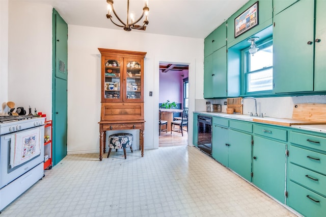 kitchen with white range with gas cooktop, a chandelier, beverage cooler, and sink