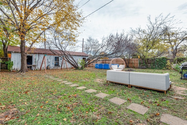 view of yard featuring a fenced in pool