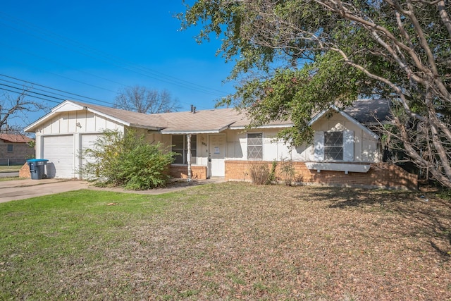 ranch-style house featuring a front yard and a garage