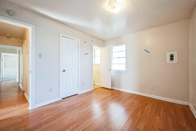 unfurnished bedroom with wood-type flooring