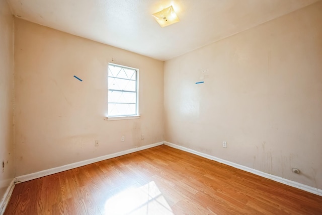 empty room featuring hardwood / wood-style floors