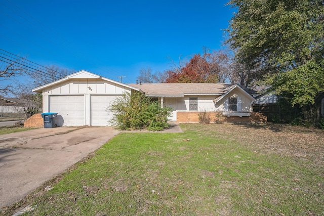 ranch-style house with a garage and a front lawn