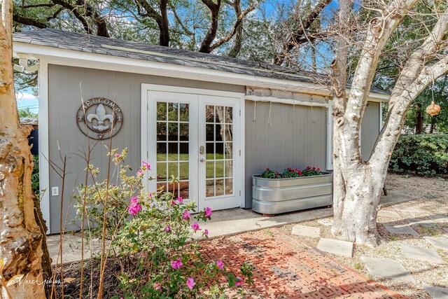 view of outbuilding featuring french doors