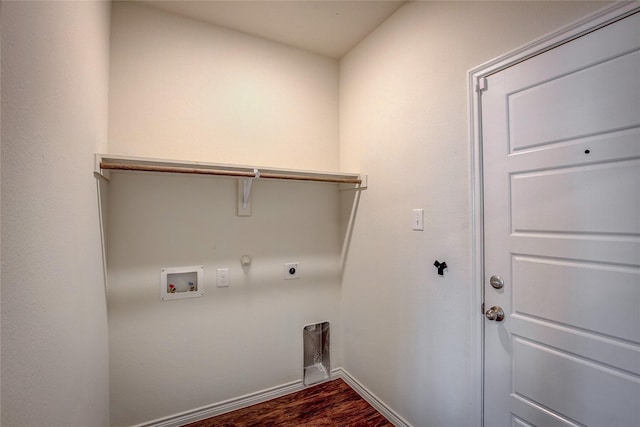 washroom featuring hookup for a gas dryer, dark hardwood / wood-style flooring, washer hookup, and hookup for an electric dryer