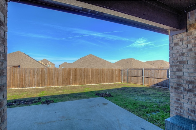 view of yard with a patio area