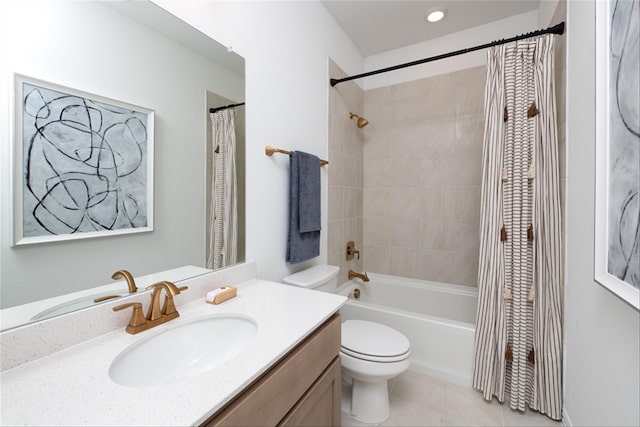 full bathroom with tile patterned floors, vanity, toilet, and shower / tub combo