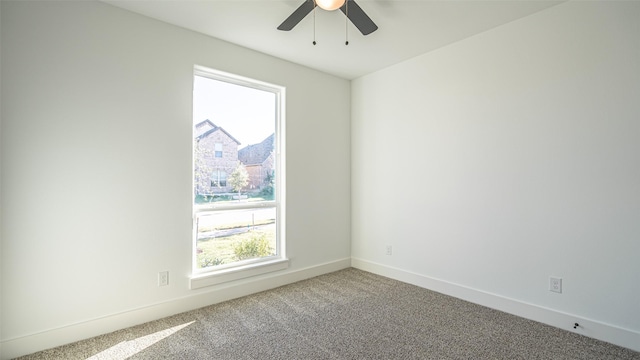 carpeted empty room with ceiling fan