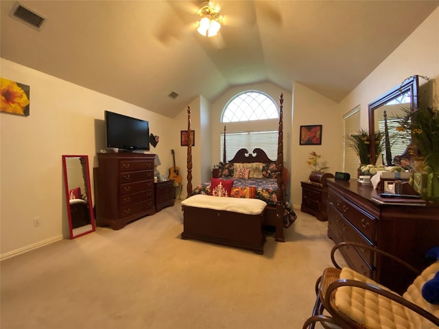 carpeted bedroom with ceiling fan and lofted ceiling