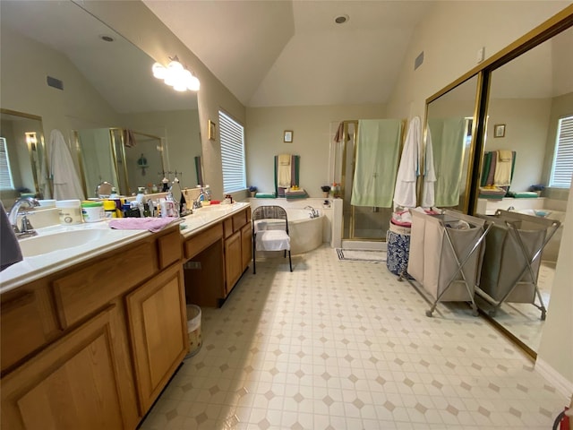 bathroom featuring plus walk in shower, vanity, and vaulted ceiling