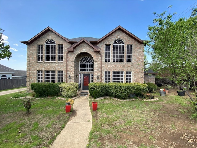 view of front of property with a front lawn