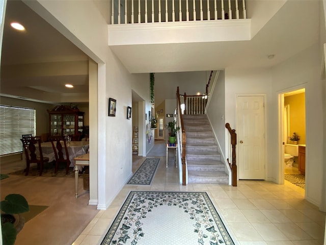 entrance foyer featuring light tile patterned floors