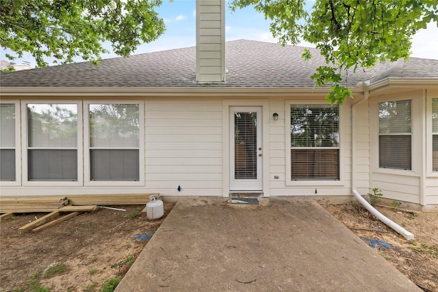 rear view of property featuring a patio