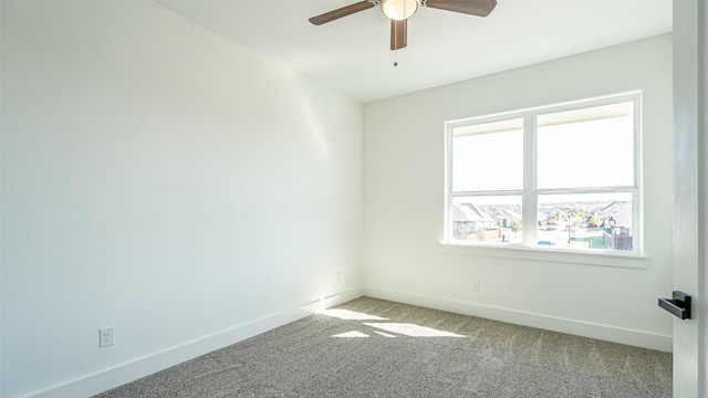 empty room with light carpet and ceiling fan