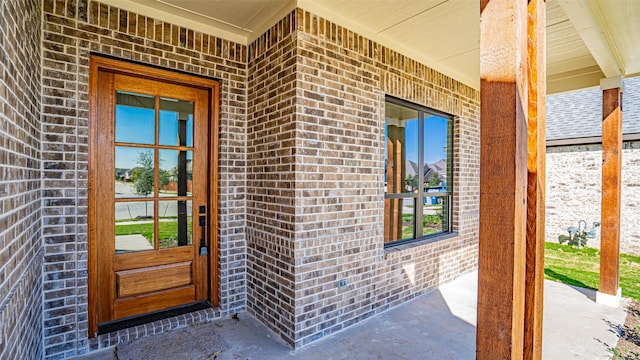 doorway to property with a porch