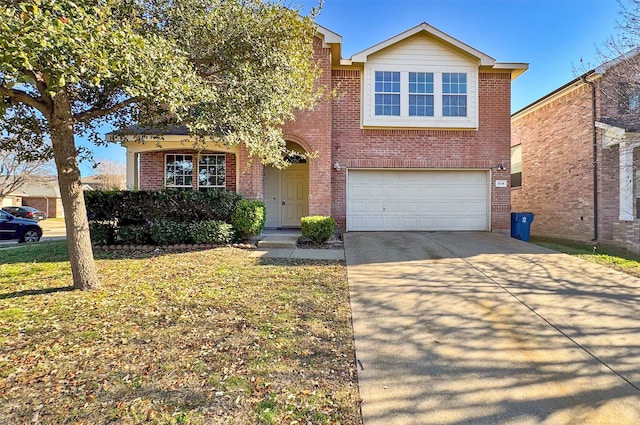 view of front of home featuring a garage and a front lawn