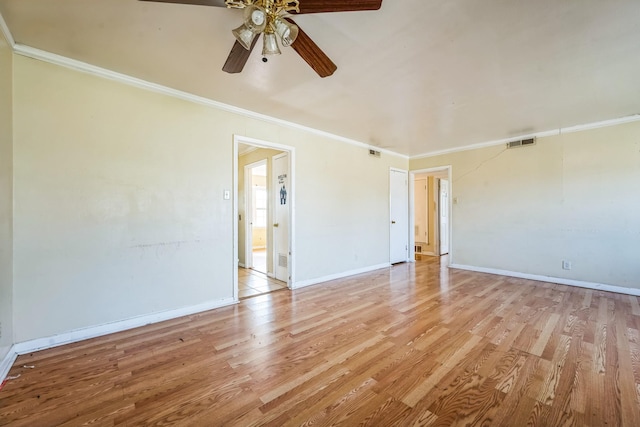 unfurnished room featuring light hardwood / wood-style flooring, ceiling fan, and crown molding