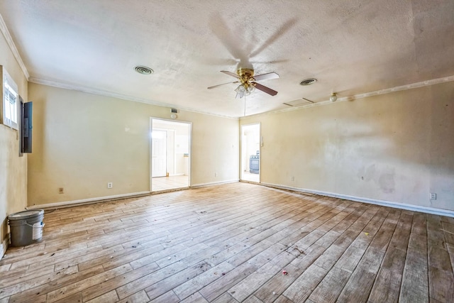 unfurnished room with a textured ceiling, light hardwood / wood-style floors, ceiling fan, and ornamental molding