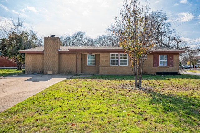 ranch-style house with a front lawn