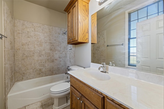 full bathroom featuring tile patterned floors, vanity, bathing tub / shower combination, and toilet