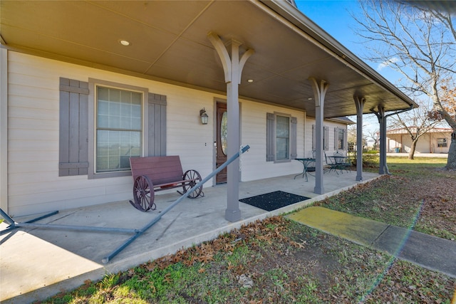 view of patio featuring a porch