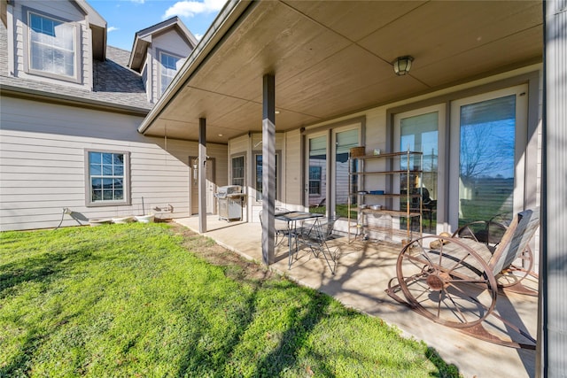 view of patio with a grill