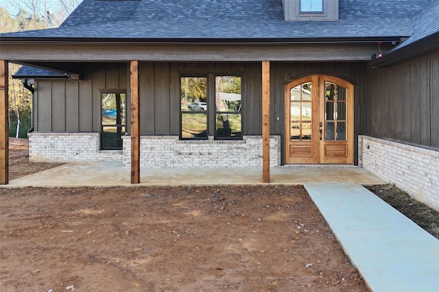 entrance to property featuring french doors