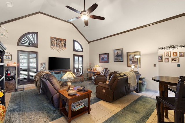 tiled living room featuring ceiling fan, ornamental molding, and high vaulted ceiling