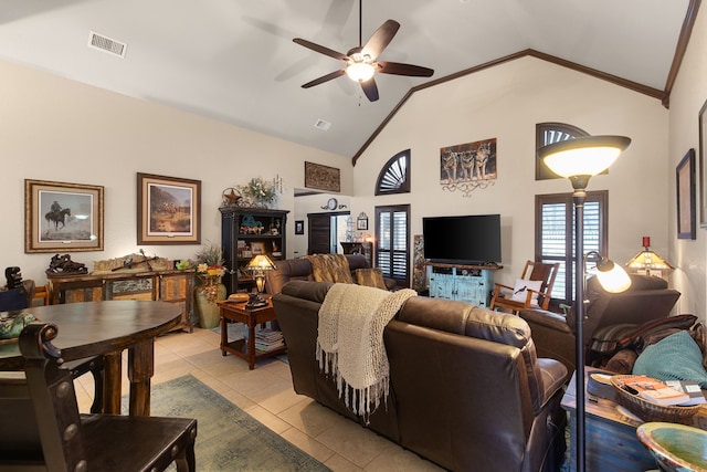 living room featuring ceiling fan, light tile patterned floors, and high vaulted ceiling