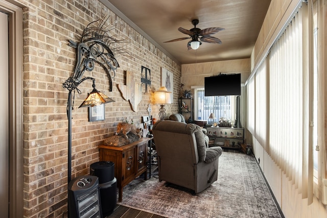 interior space featuring ceiling fan and heating unit