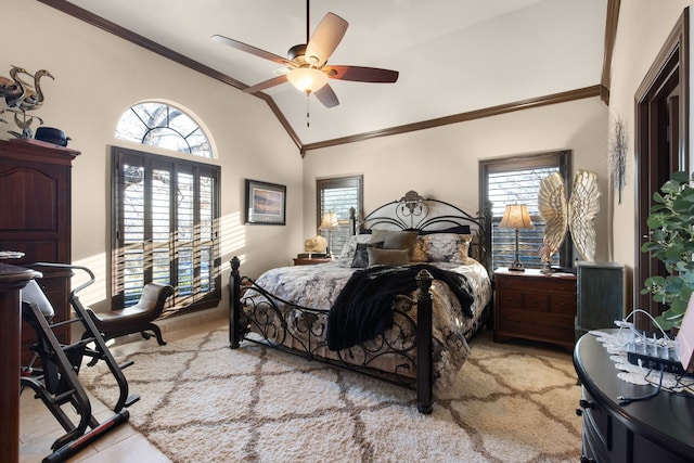 bedroom with ceiling fan, vaulted ceiling, and ornamental molding