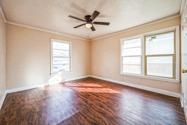 empty room with ceiling fan, crown molding, dark hardwood / wood-style floors, and a textured ceiling