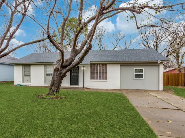 ranch-style house with a front lawn