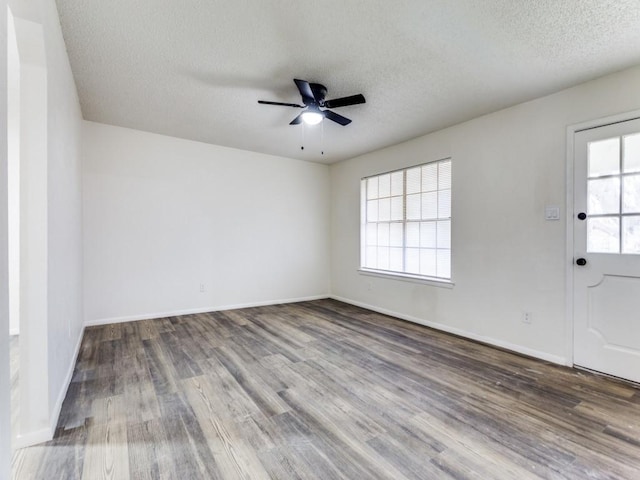 unfurnished room featuring wood-type flooring, a textured ceiling, and ceiling fan